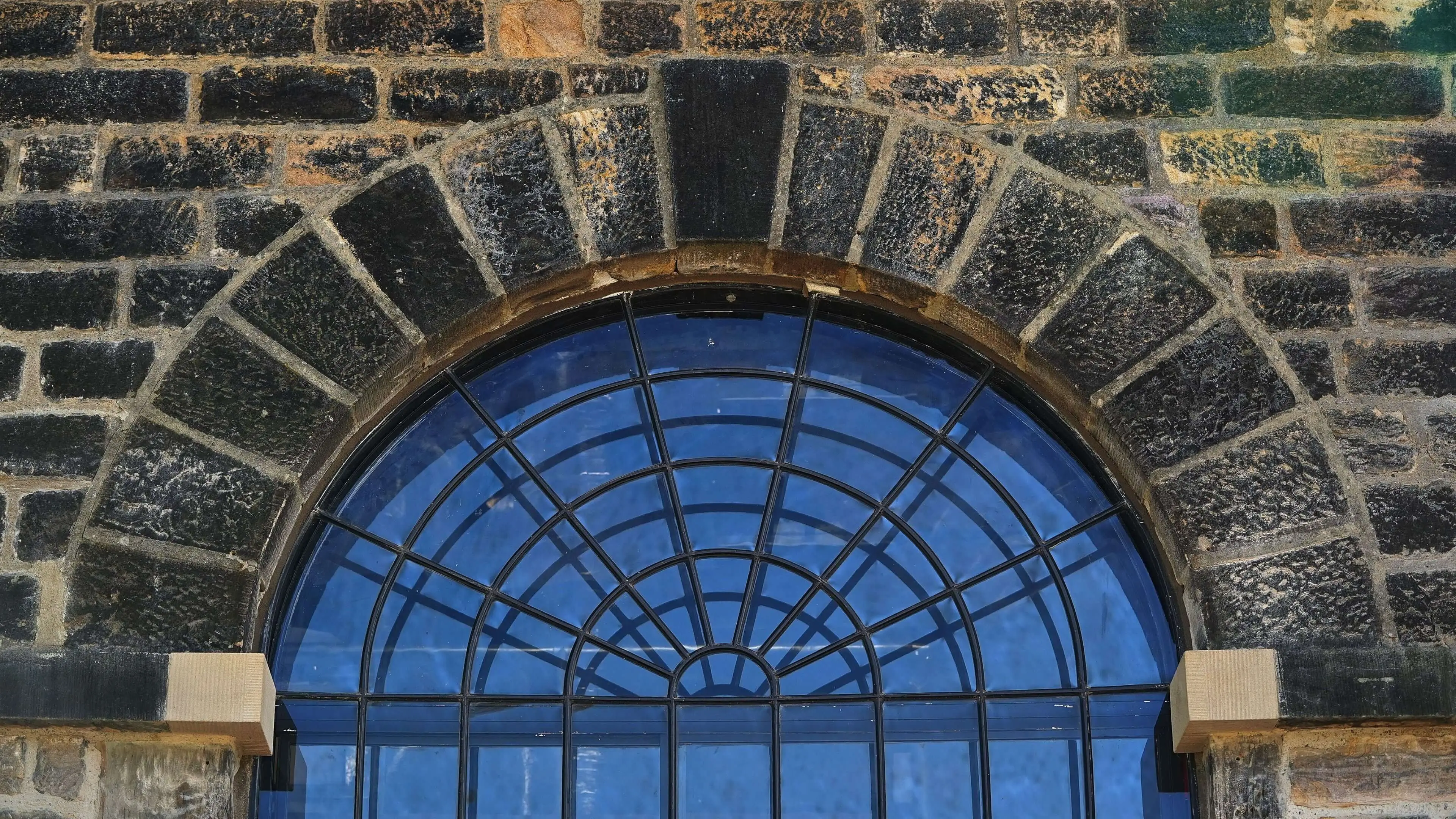 Panes of glass in an arch